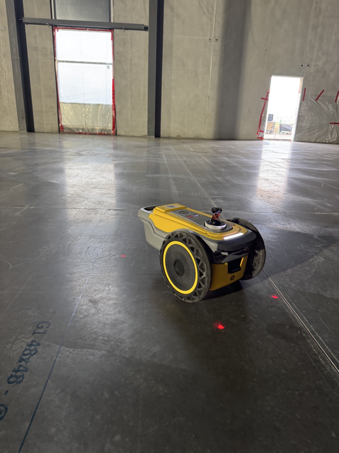 HP SitePrint robot on the jobsite floor