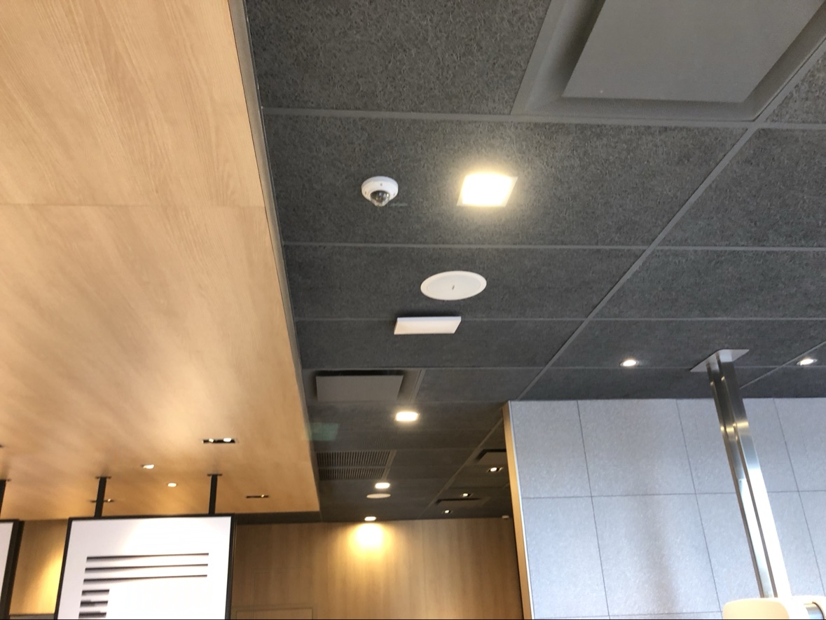 Acoustic tile ceiling with wood soffit