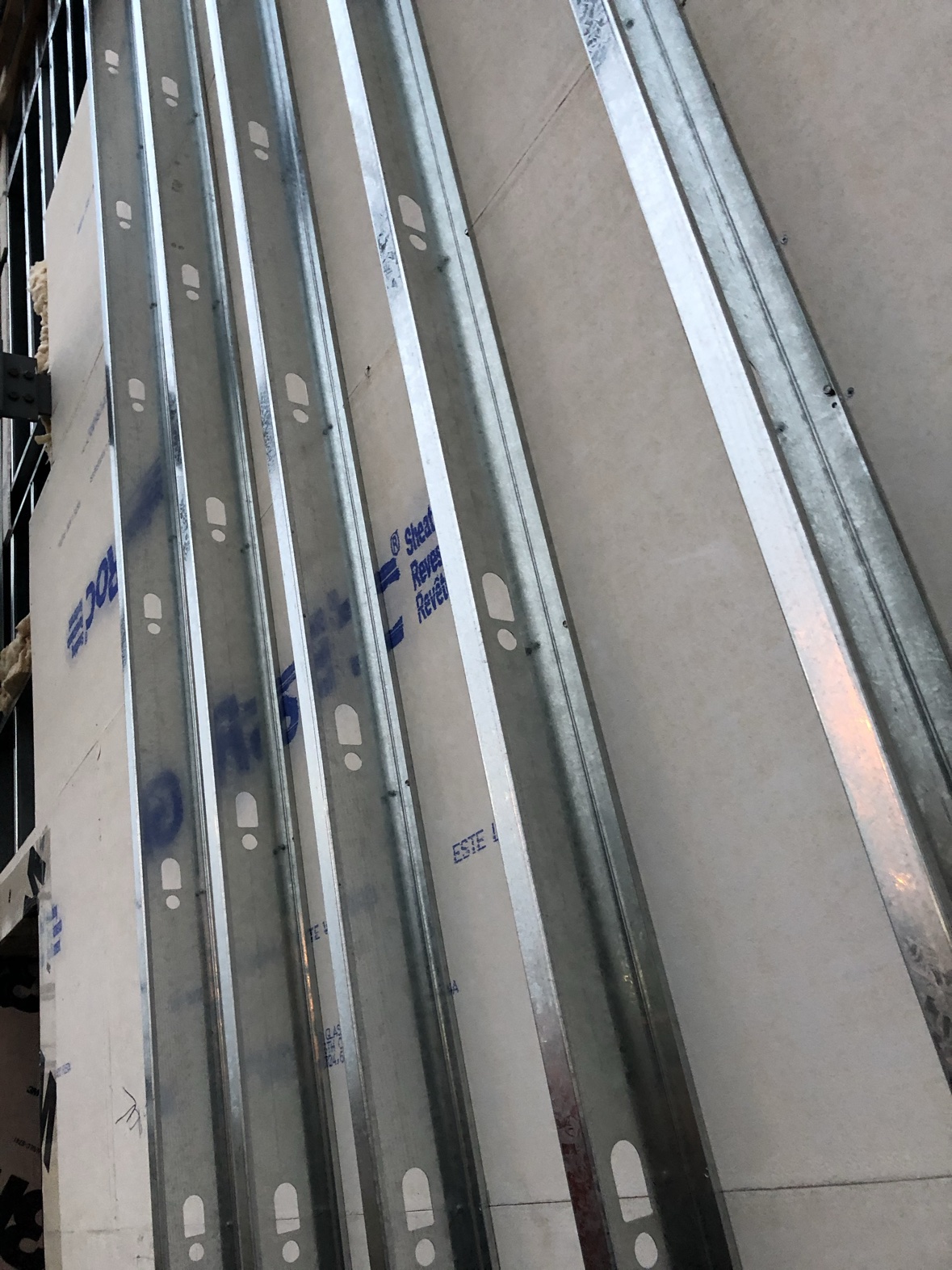 Steel stud framing with exterior sheathing