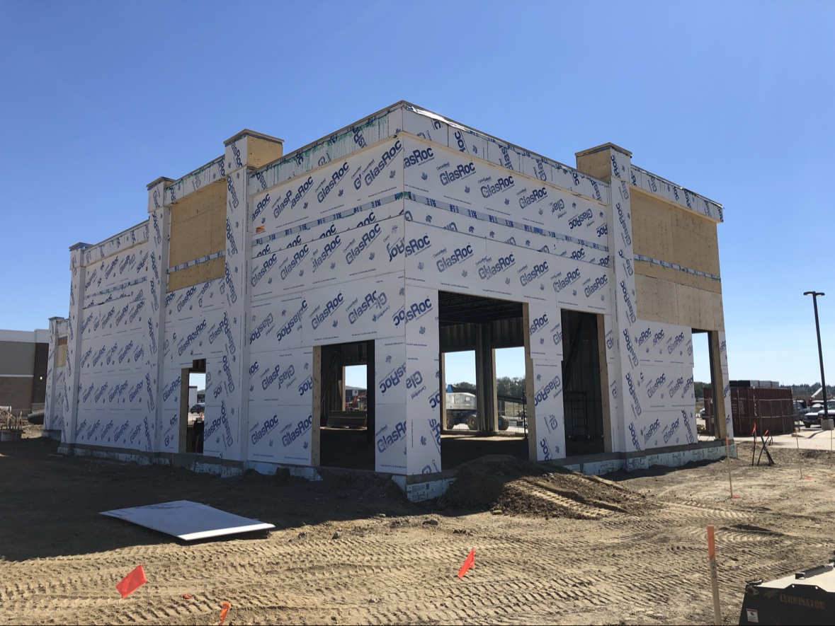 Commercial building with exterior sheathing