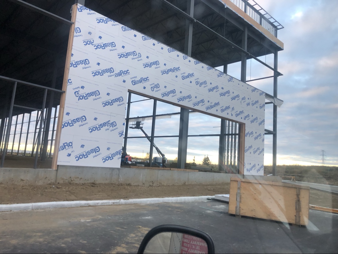 Steel structure with sheathed wall